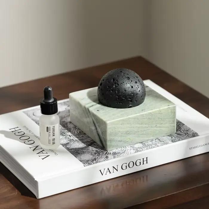 Diffuseur de pierre de roche de lave noire avec base en marbre