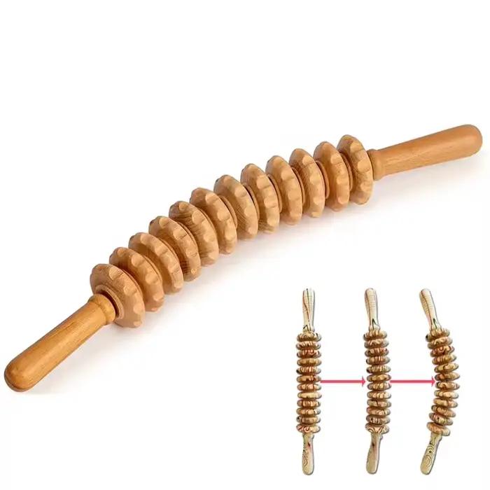 Bâton de massage en bois à roulettes