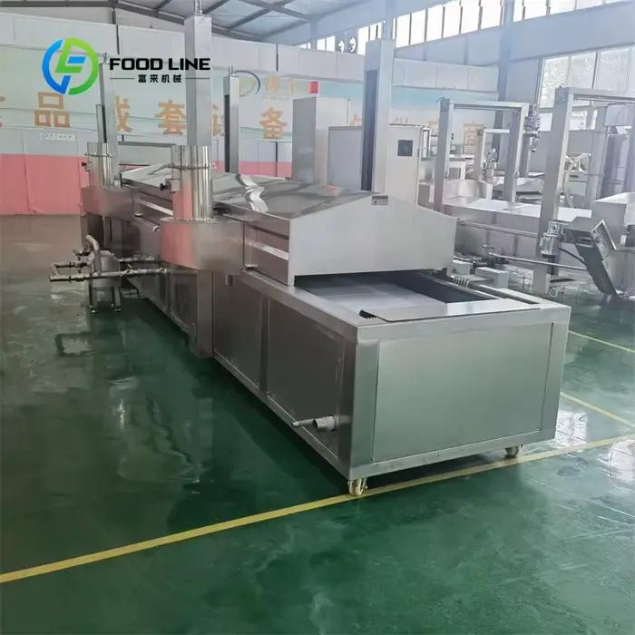 Friteuse commerciale personnalisée à fonctionnement continu avec contrôle automatique du niveau d'huile pour une qualité de friture constante