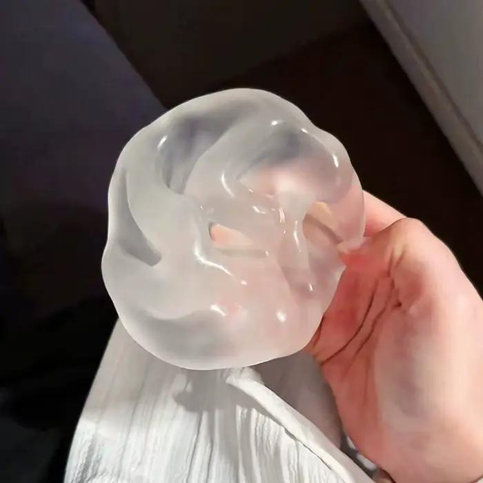 Balle anti-stress en huile de coco faite à la main : douce et moelleuse