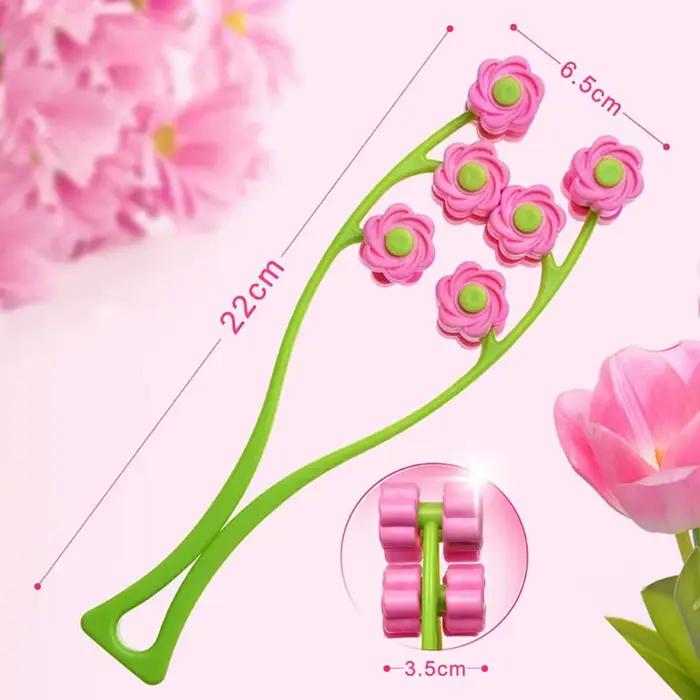 Rouleau de massage facial portable en forme de fleur