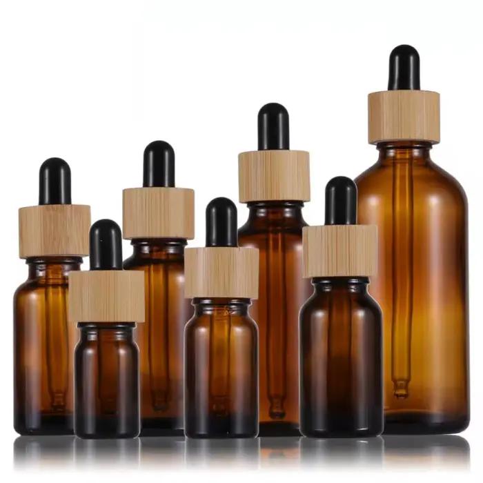 Flacon d'huile essentielle en verre ambré de 5 à 100 ml avec couvercle en bois de bambou