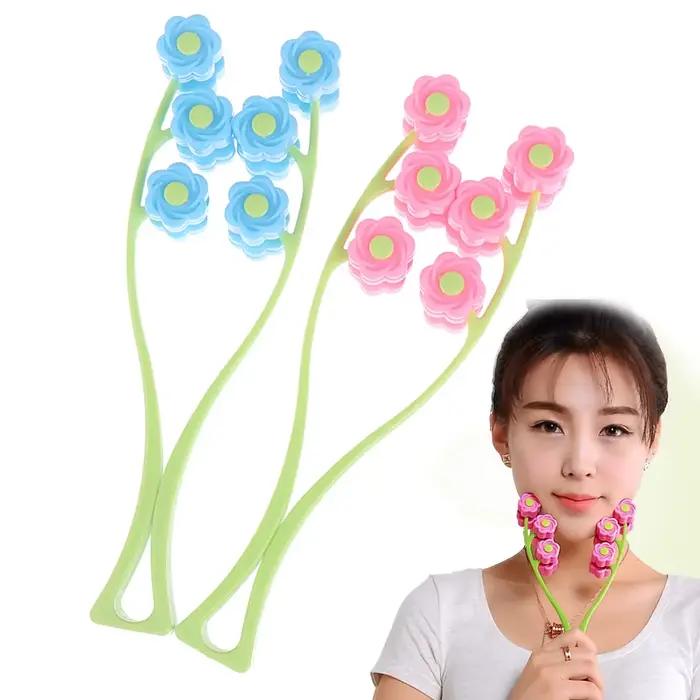 Rouleau de massage facial portable en forme de fleur